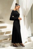 side view of black long sleeve maxi dress side view of black long sleeve maxi dress
