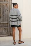 back view of grey black stripe sweater back view of grey black stripe sweater
