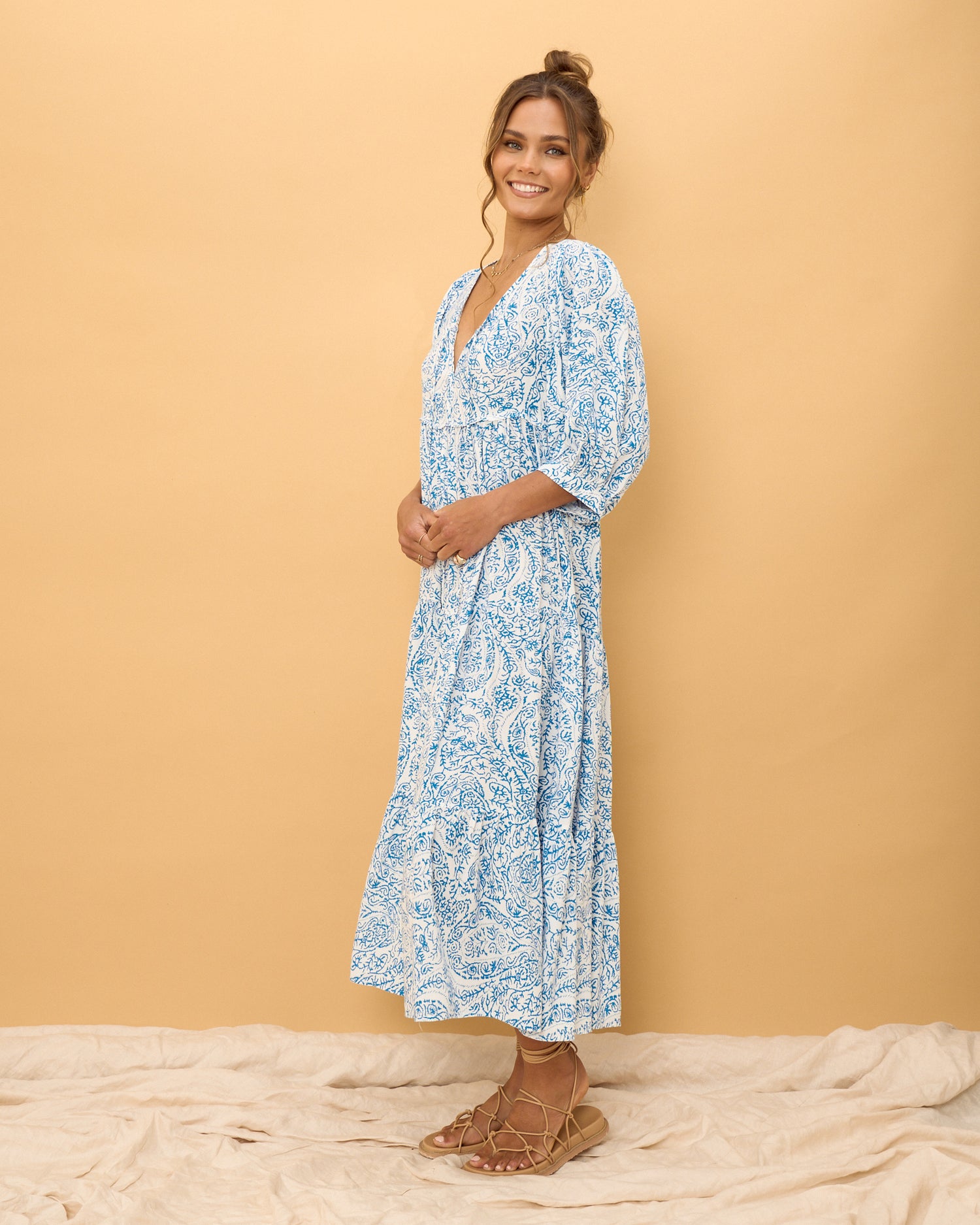 woman wearing a blue boho dress