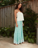 Woman wearing the jasmine white cami top Woman wearing the jasmine white cami top