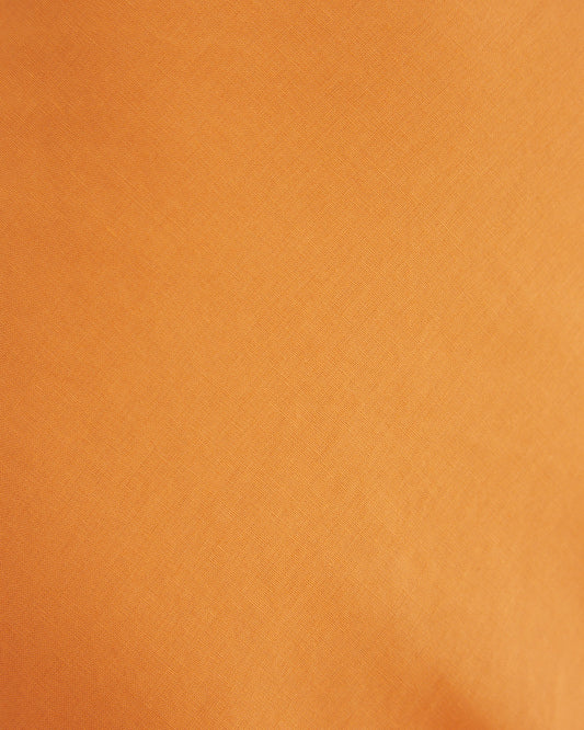 Close up of the sabrina orange cut out midi dress