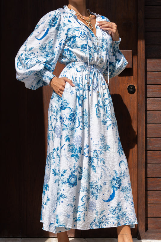 close up of blue floral long sleeve maxi dress