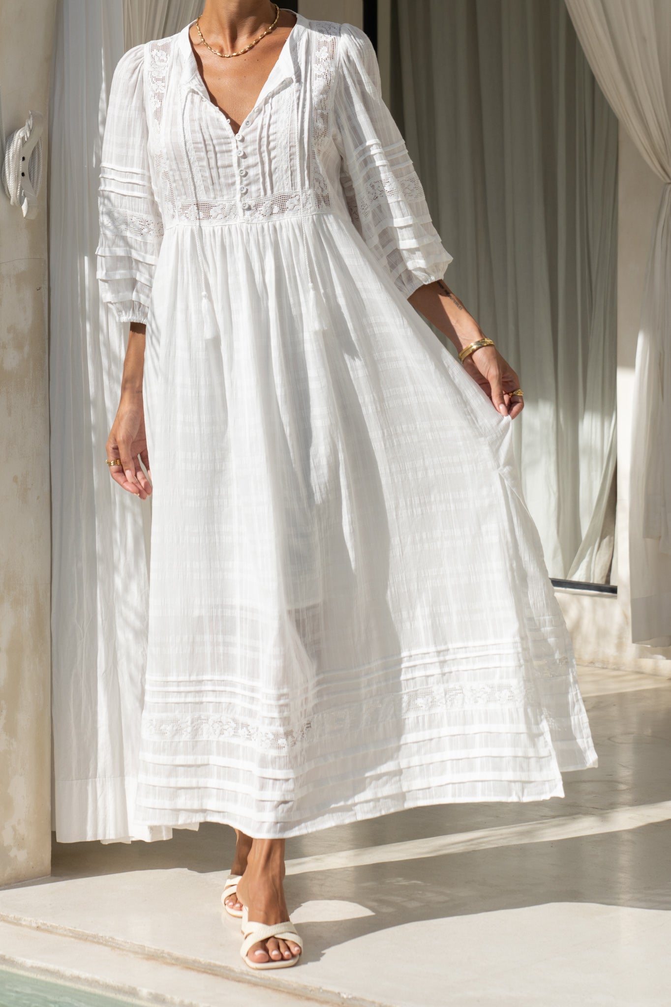 close up of white lace detail maxi dress