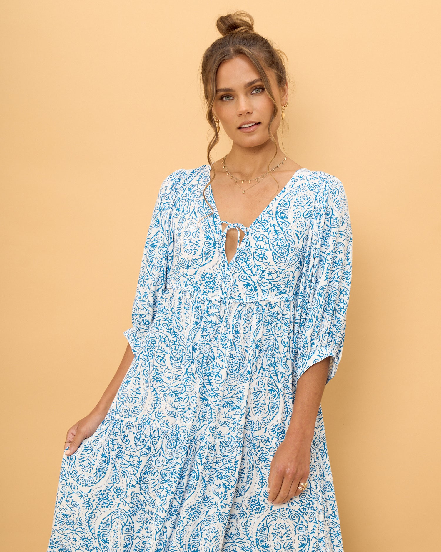 close up of women wearing a blue boho dress