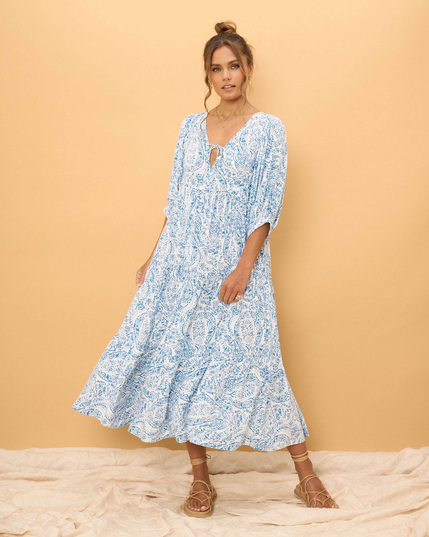 woman wearing a blue boho dress