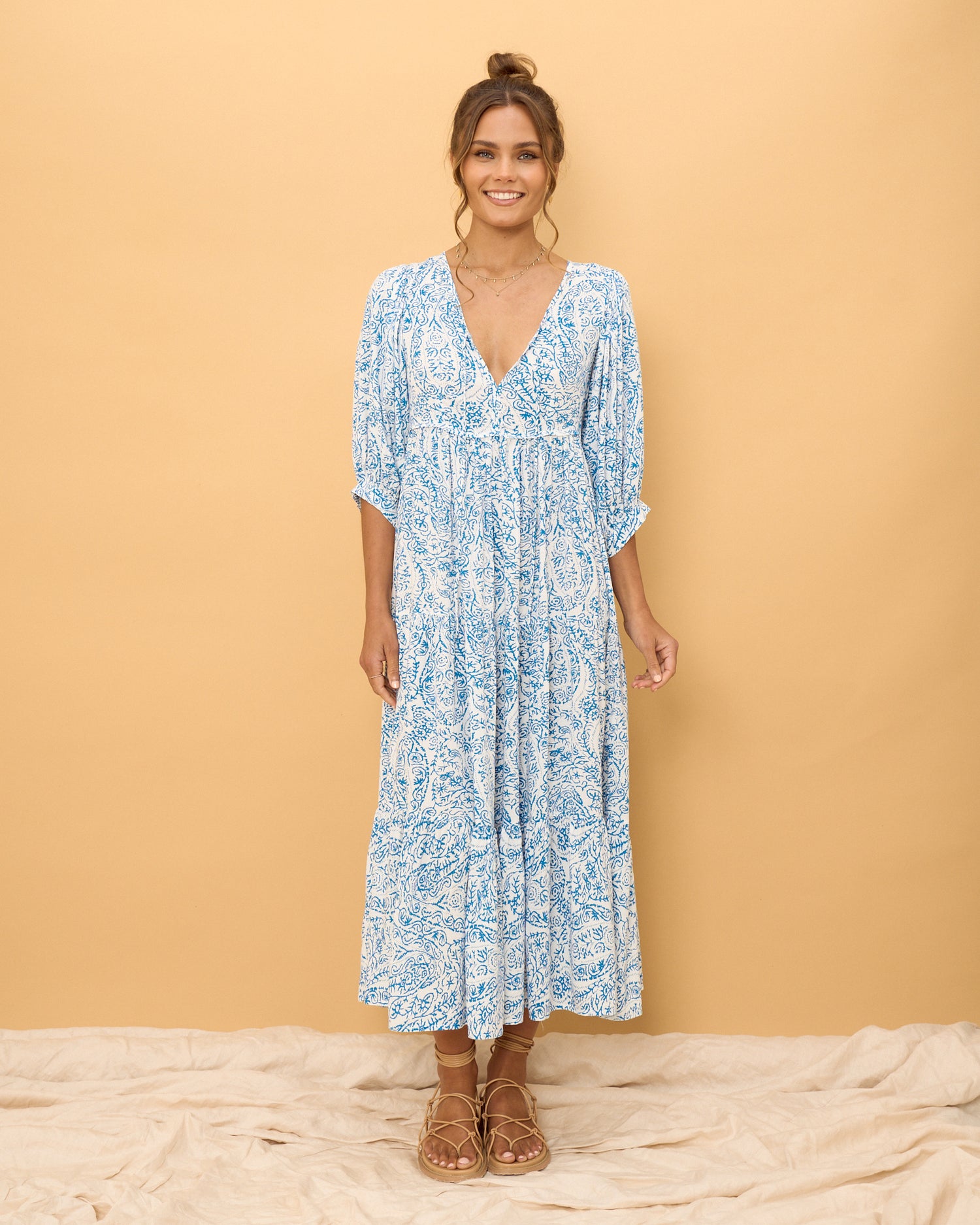 woman wearing a blue boho dress