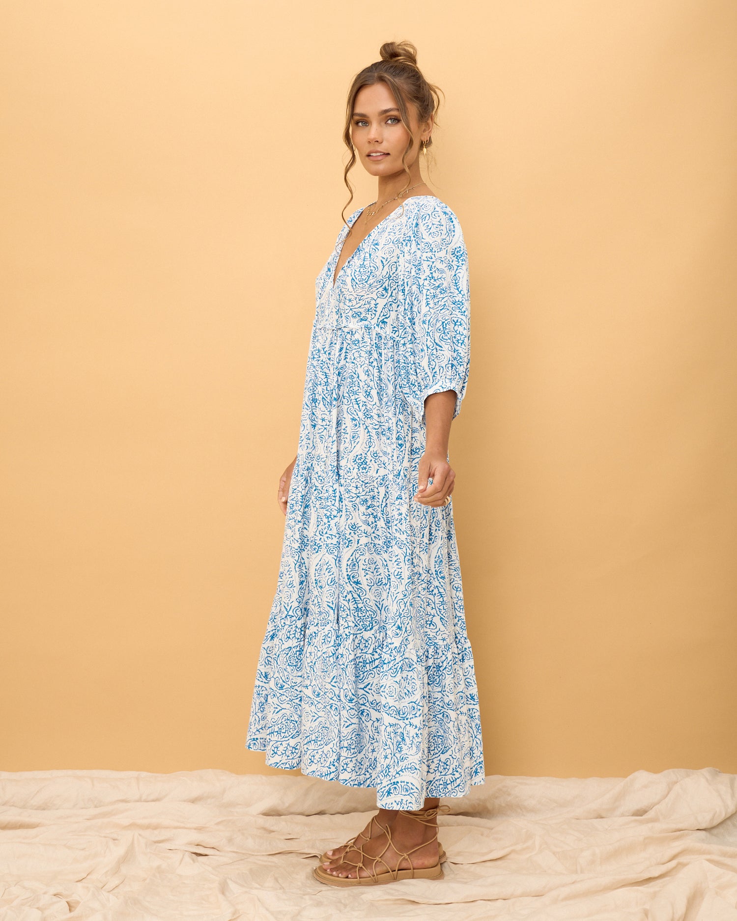 woman wearing a blue boho dress