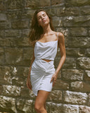 Woman wearing the dakota twisted white mini dress