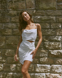 Woman wearing the dakota twisted white mini dress