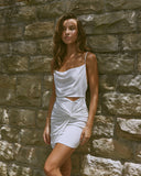 Woman wearing the dakota twisted white mini dress
