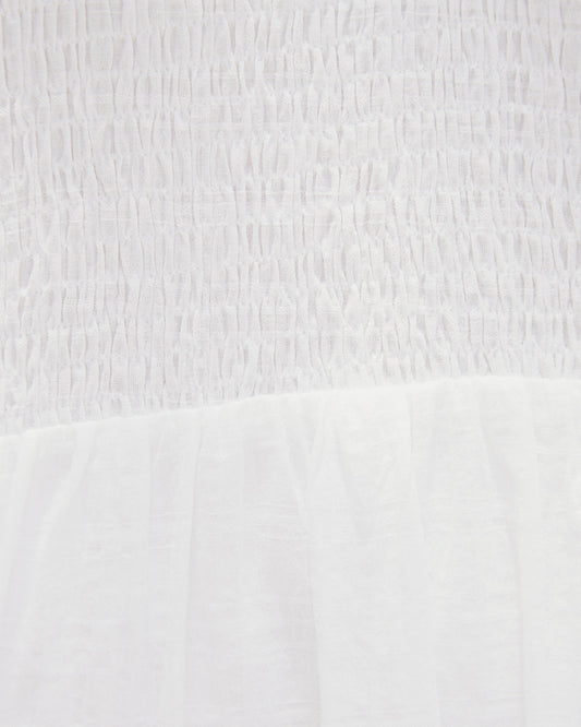 Close up of the everleigh white puff sleeves mini dress 
