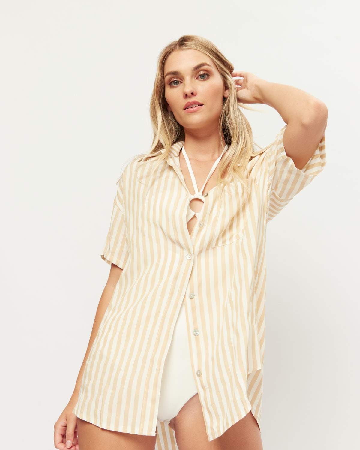 Woman wearing faigy stripe short sleeve shirt