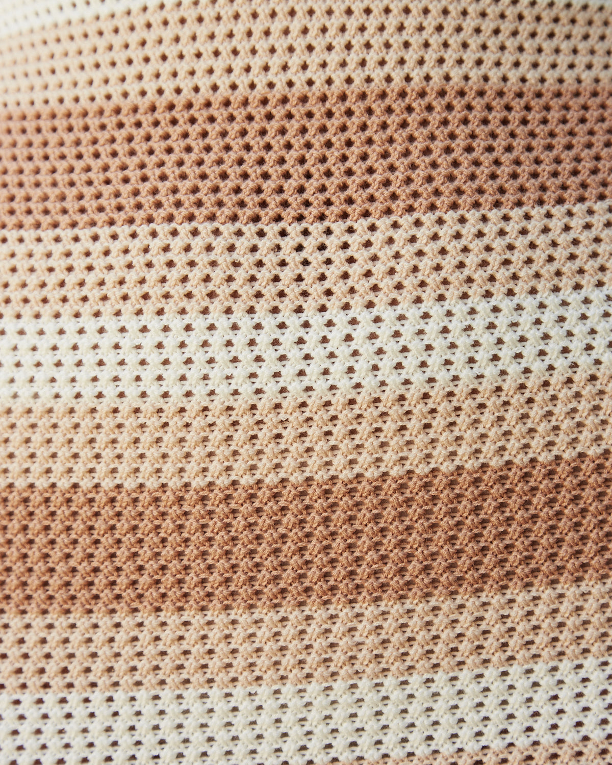 Close up of the freyja brown halterneck mini dress