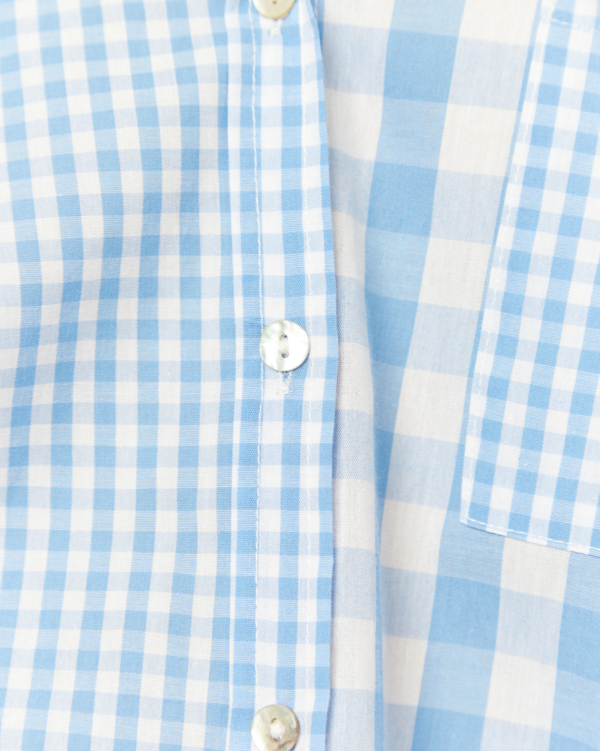 Close up of the gracie blue gingham collared shirt 