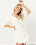 Woman wearing the illiana broderie off shoulder mini dress 