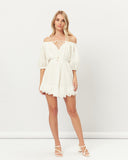 Woman wearing the illiana broderie off shoulder mini dress 