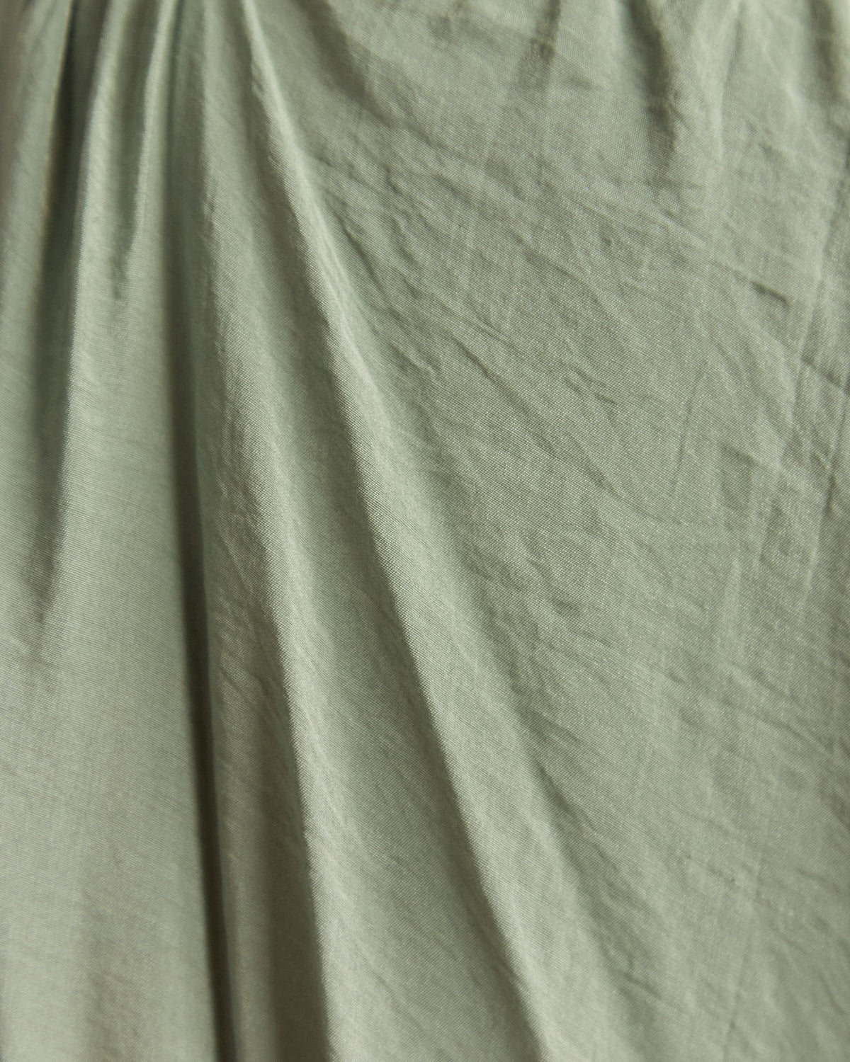 Close up of the lana green cut out halter neck maxi dress 