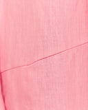 Close up of the layla pink asymmetrical midi skirt