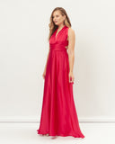 Woman wearing the leah red infinity maxi dress