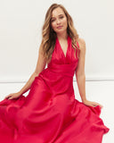 Woman wearing the leah red infinity maxi dress