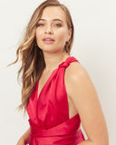 Woman wearing the leah red infinity maxi dress