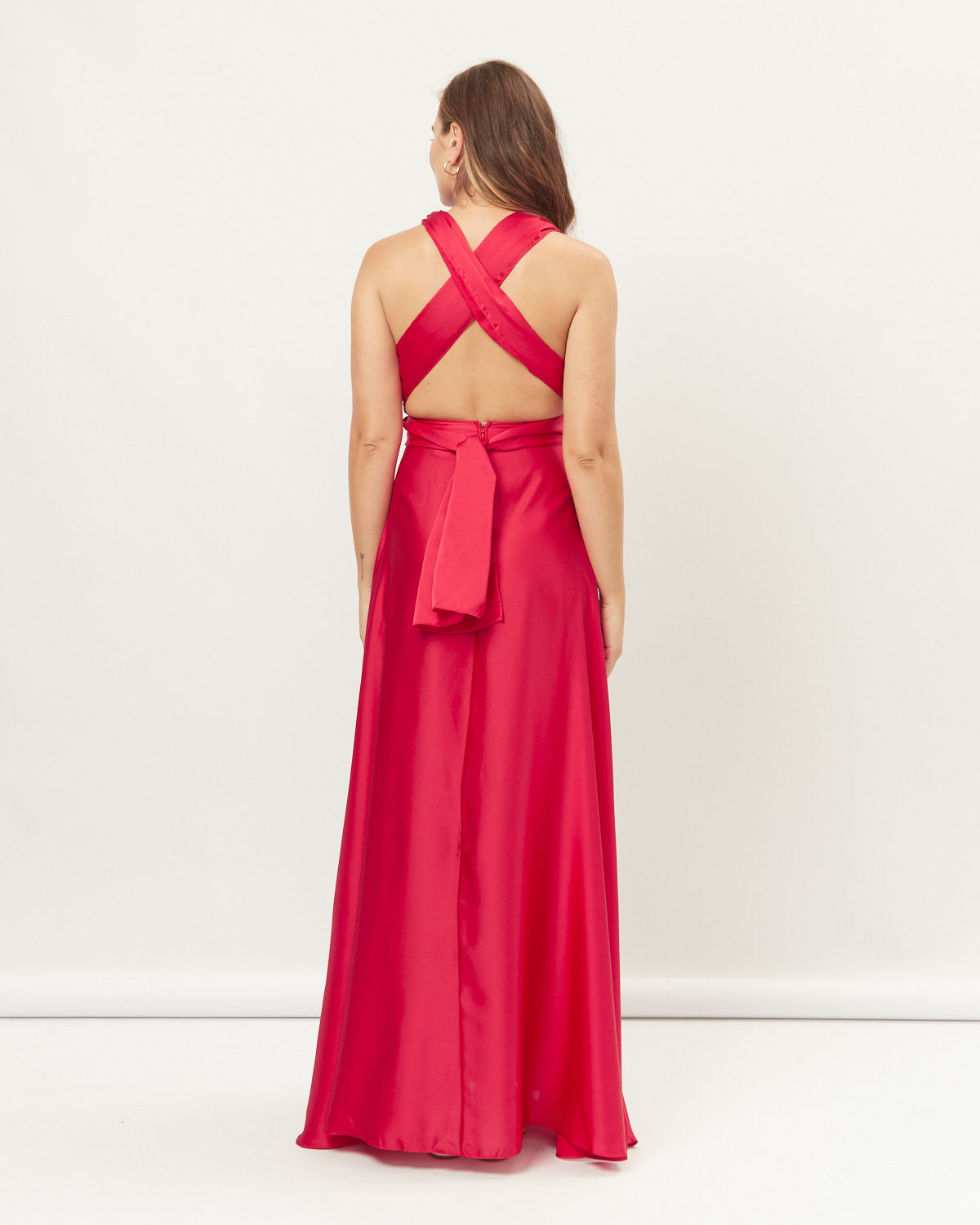 Woman wearing the leah red infinity maxi dress