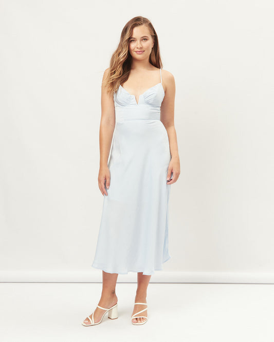 Woman wearing the lila blue sweetheart plunge midi dress