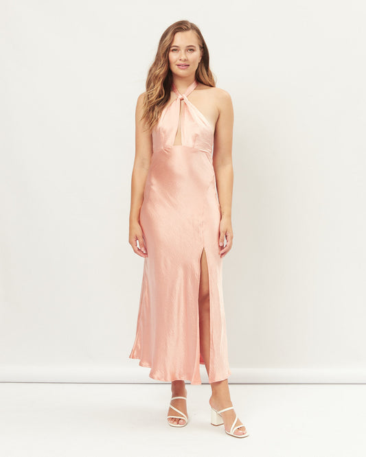 Woman wearing noelle pink halter midi dress