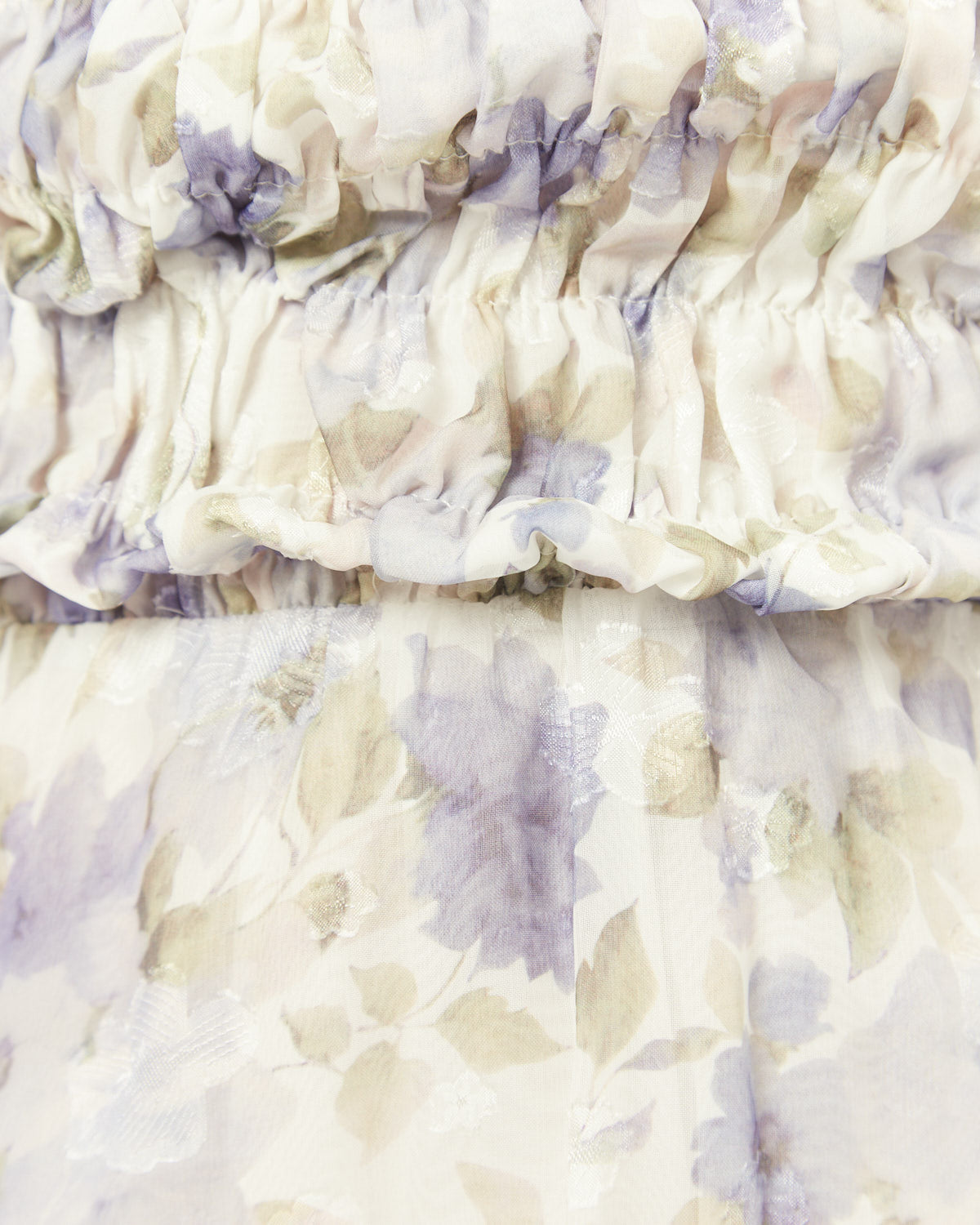 Close up of the nyla purple floral tie back mini dress
