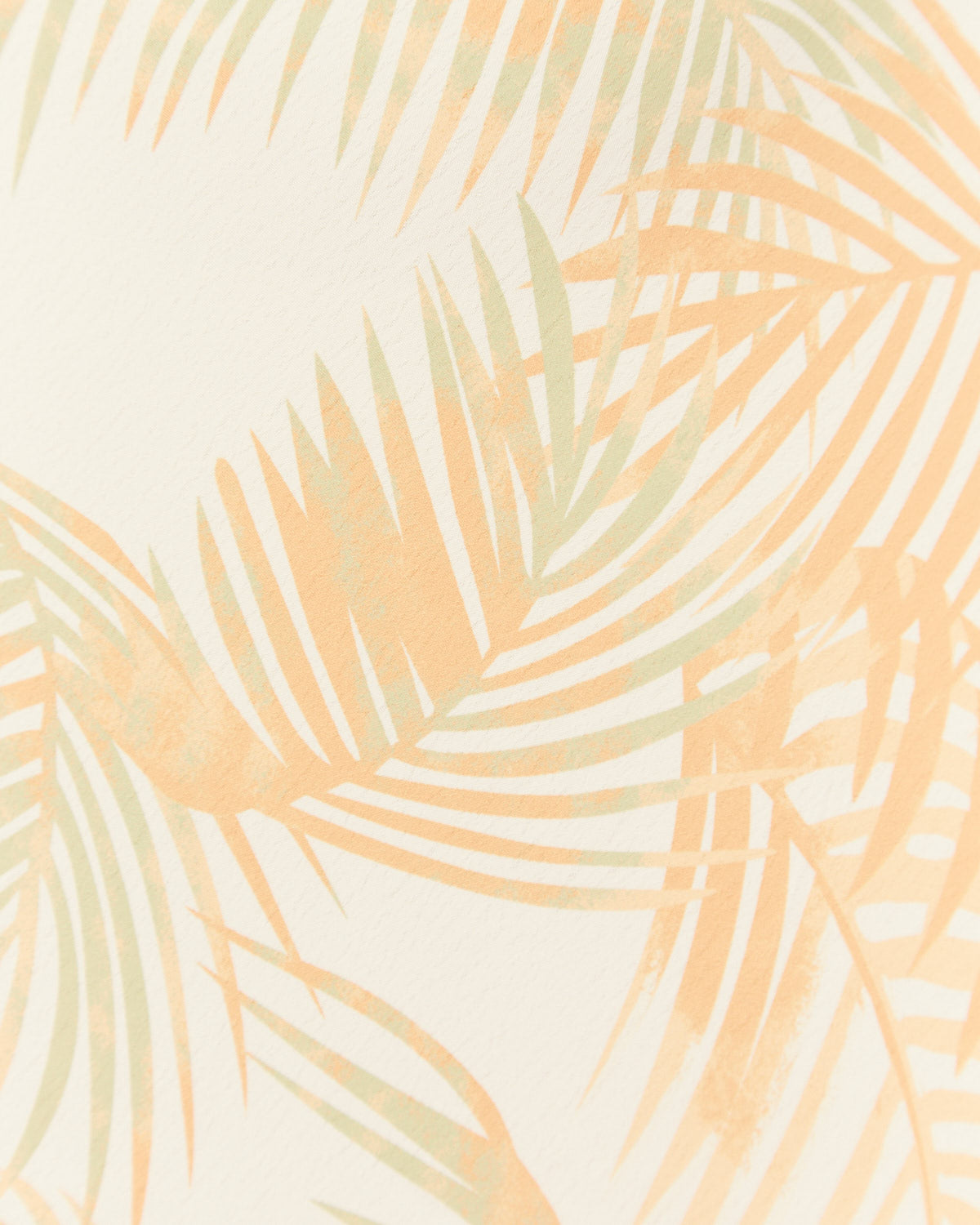 Close up of the odessa orange palm leaves midi dress