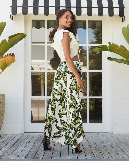 Woman wearing the samantha leaf prints high low skirt