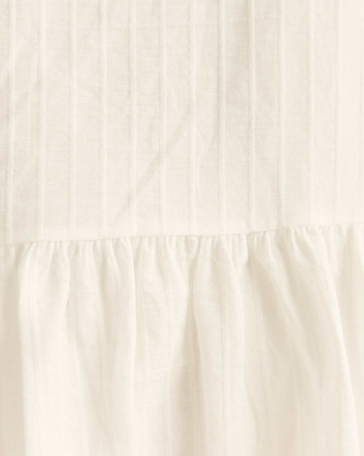 Close up of the xyla white mini dress